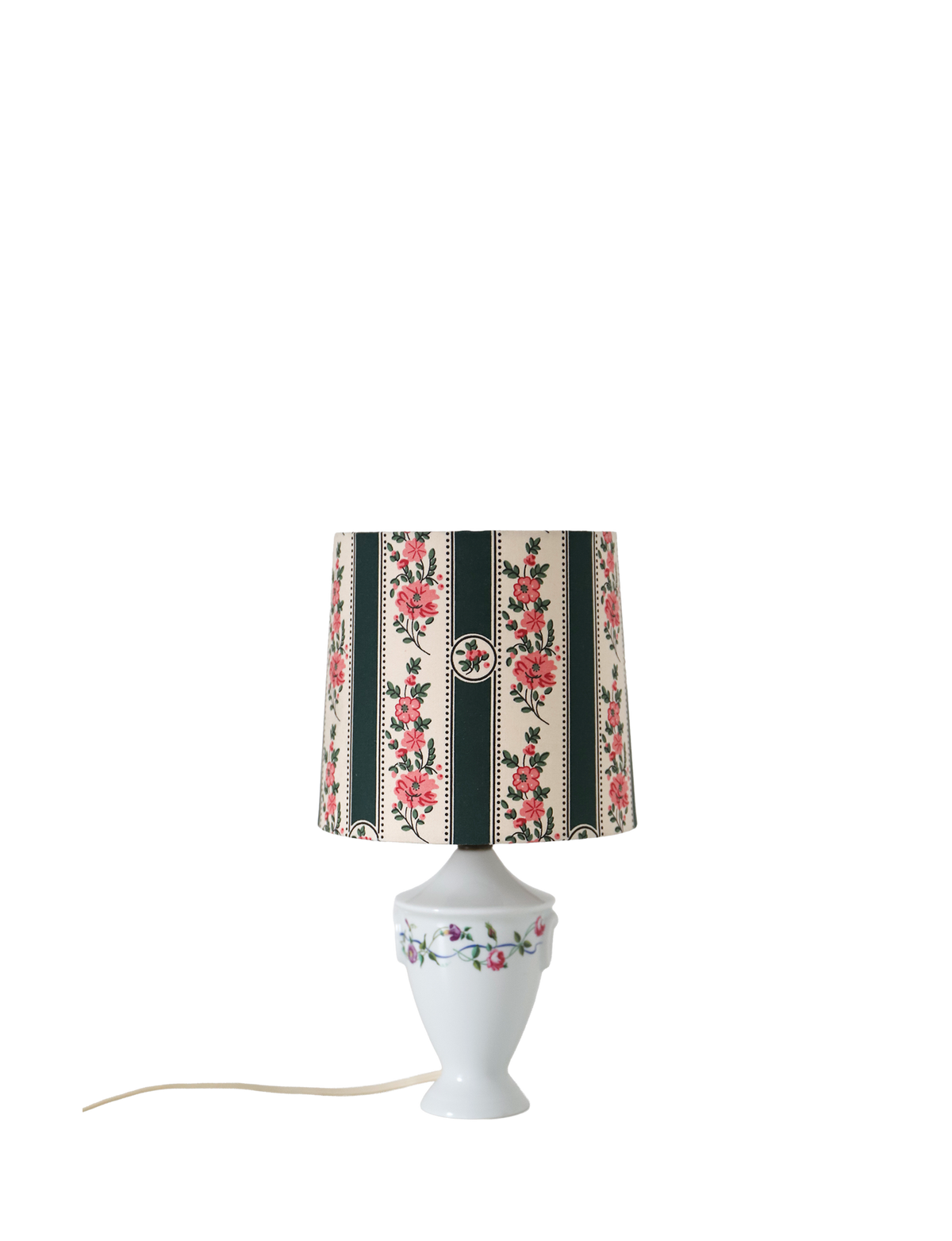 Upcycled vintage lamp — antique bronze candlestick base and graphic floral pattern